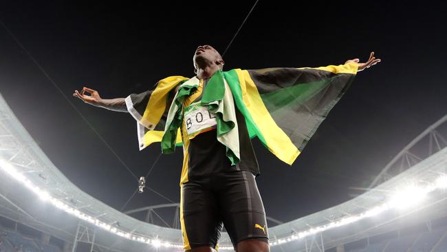 Jamaica's Usain Bolt celebrates winning another Olympic gold medal.