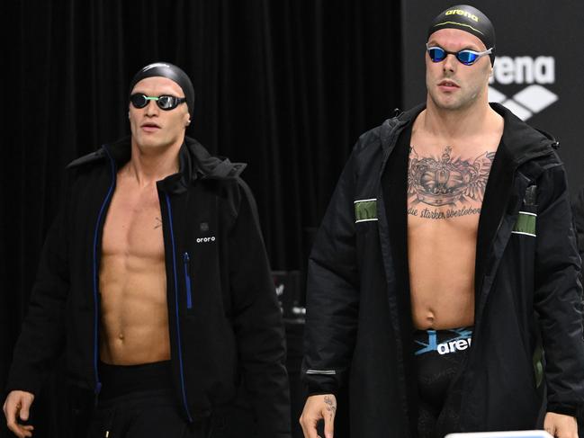 MELBOURNE, AUSTRALIA - JUNE 18: Cody Simpson and Kyle Chalmers of Australia walk out to compete in the Men's 100m Butterfly during day six of the Australian 2023 World Swimming Championship Trials at Melbourne Sports and Aquatic Centre on June 18, 2023 in Melbourne, Australia. (Photo by Quinn Rooney/Getty Images)