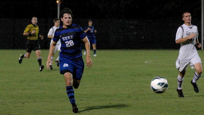 Mr McLeod playing soccer for Duke University.