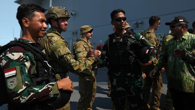 Australian Defence Force and Indonesian National Armed Forces members aboard the HMAS Adelaide ahead of Exercise Keris Woomera. Picture: Zizi Averill