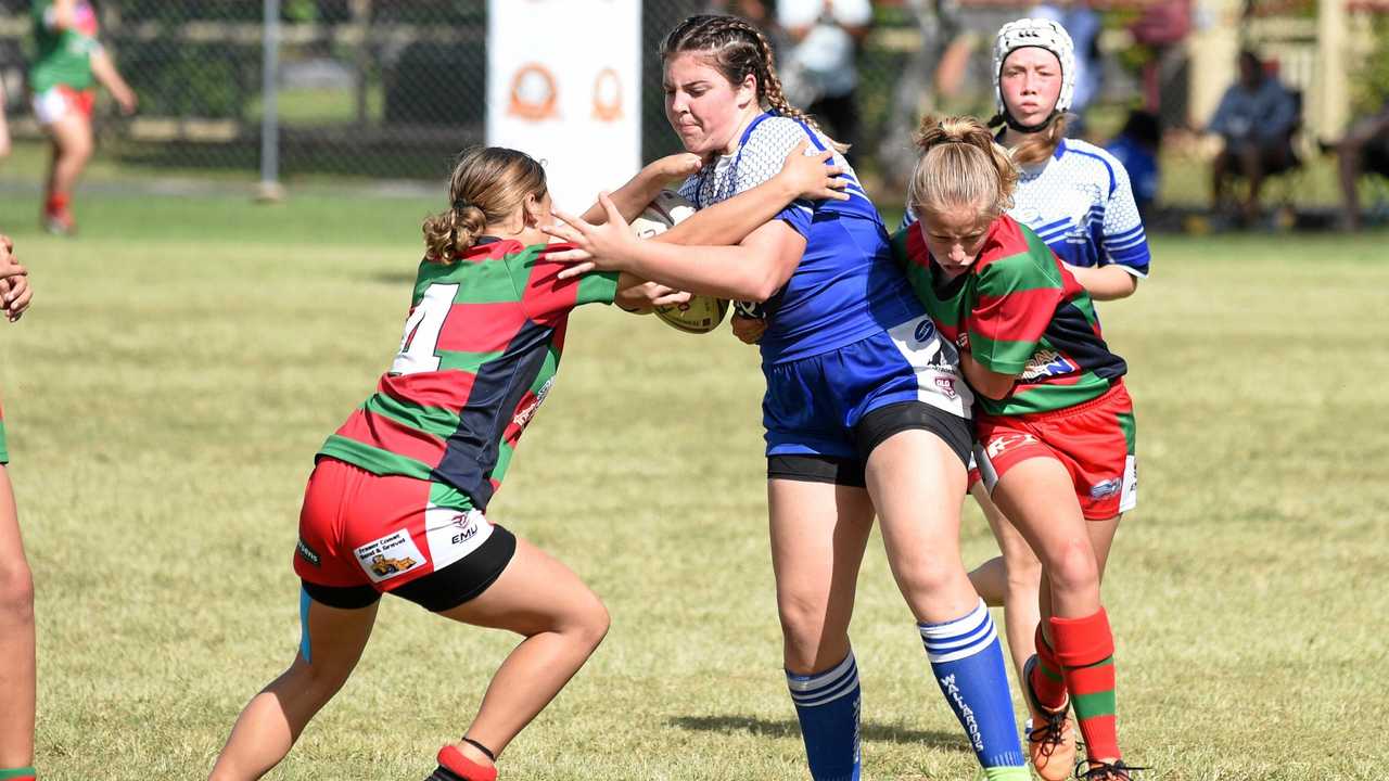 Charli Beazley (Wallaroos captain) tackled by the defence. Picture: Alistair Brightman