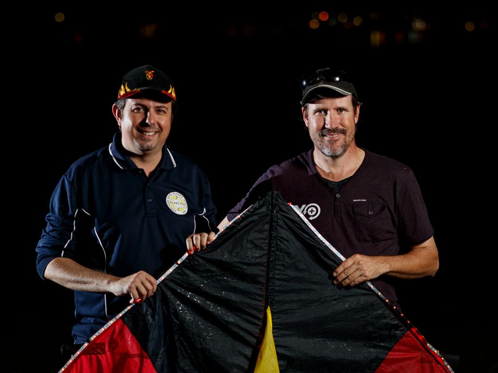 Redcliffe Kite Club’s Craig Stevens and Mick Crowley helped create the night-time colour at Clontarf’s Pelican Park ahead of Redcliffe KiteFest. Photo: Josh Woning.