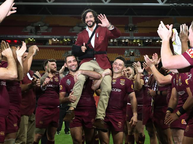 QLD's Johnathan Thurston is chaired off after Game 3 of the State of Origin series between the NSW Blues and QLD Maroons at Suncorp Stadium, Brisbane. Picture: Brett Costello