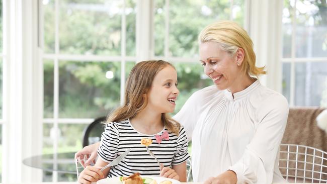 Randwick mum Anya Haywood with her daughter Lola Warner, 9, for a story about how kids should eat with a knife and fork rather than their hands. Picture: Dylan Robinson