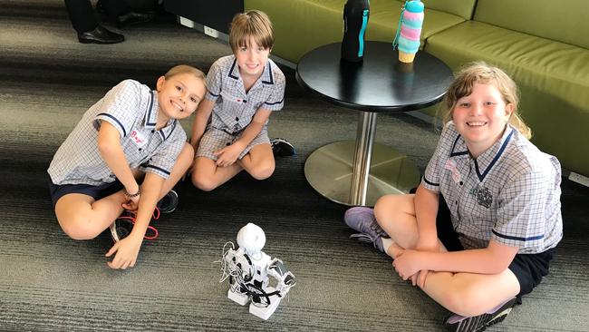 Happier times. Students from Ingham State School get involved in the robotics and coding workshop at the Hinchinbrook Library. Picture: Cameron Bates