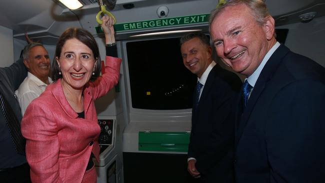 NSW Premier Gladys Berejiklian, Transport Minister Andrew Constance and Riverstone MP Kevin Conolly on a Metro train ahead of its opening. Picture: Toby Zerna