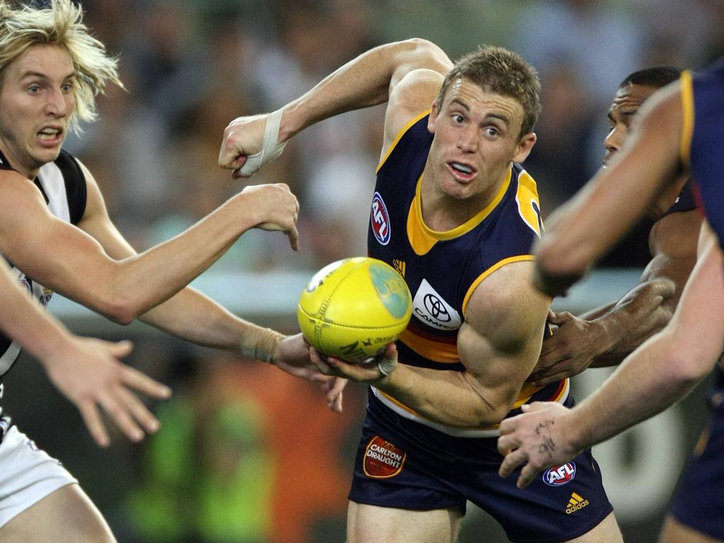 Simon Goodwin in action for the Adelaide Crows during a 2009 semi-final against Collingwood. The Crows team narrowly lost the match, with Goodwin as captain. Picture: Michael Klein