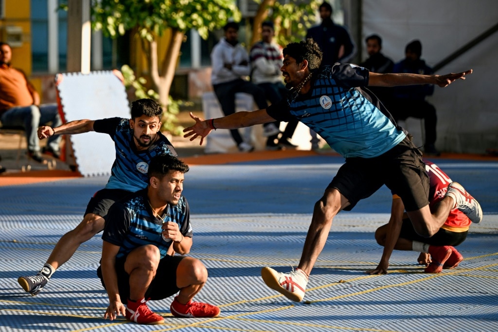 Members of India's men's kho kho team take part in selection trials ahead of the upcoming Kho Kho World Cup in New Delhi