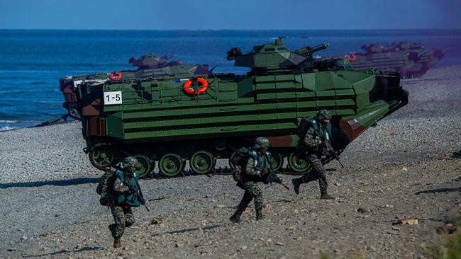 Soldiers disembark from AAV7 amphibious assault vehicles during the Han Kuang military exercise, which simulates China's People's Liberation Army (PLA) invading the island. Picture: Getty Images