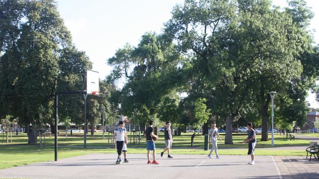 Kids playing basketball in Whitmore Sq. Picture: Eugene Boisvert