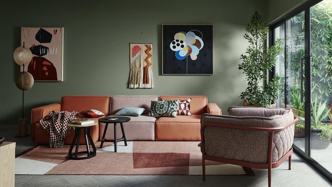 Dulux Herbalist provides the backdrop for this earthy palette with shades of terracotta, cream and even soft pink. Deep charcoal accents provide balance.