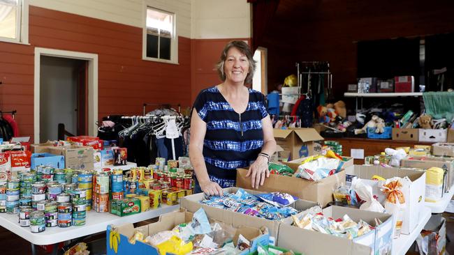 Dee Greig looks through the donations at the community hall in Quaama. Picture: Nikki Short.