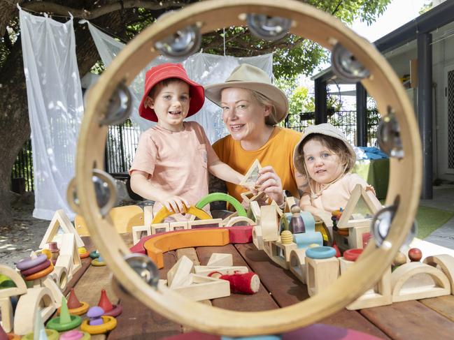 Goodstart Early Learning in Red Hill scored a perfect 10 in the latest KindiCare Quality Index. Educational Leader Davinia Munn is pictured here with Ned, 5, and Sophie, 3. Picture: Richard Walker