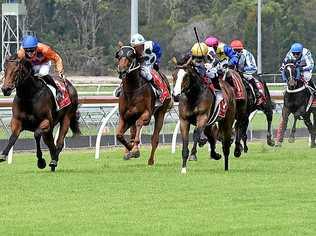 AT CORBOULD PARK: Horses rattle down the straight at Sunday's meeting. Picture: Warren Lynam