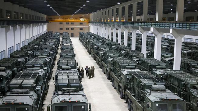 Kim Jong-un inspecting the missile launcher vehicles that were to be newly equipped to the combined missile units of the Korean People's Army (KPA). Picture: KCNA VIA KNS/AFP