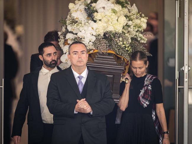 Zonfrillo’s wife Lauren Fried and close friend Andy Allen carry the casket from the service. EXCLUSIVE PICTURE/ News Corp/Julian Andrews