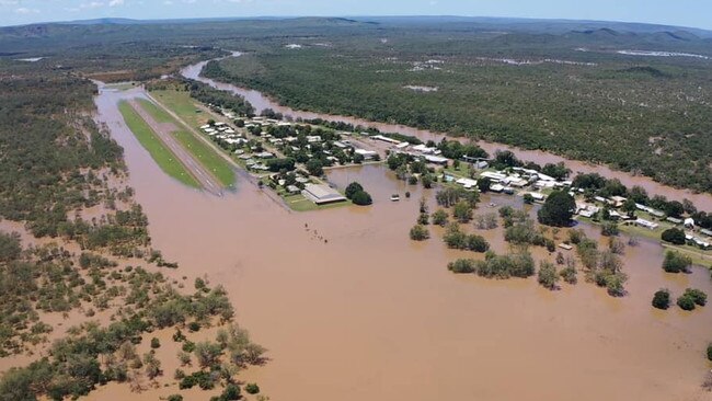 Aerial view of floodwaters encompassing the Daly River community on February 27. Picture: Pjay Ahfat