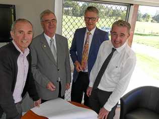 UNIT TRUST: Member for Clarence Chris Gulaptis, Clarence Village chairman Geoff Shepherd, architect Dayne Mearns and the Member for Page Kevin Hogan go over the plans for the 20 new units. Picture: Tim Howard