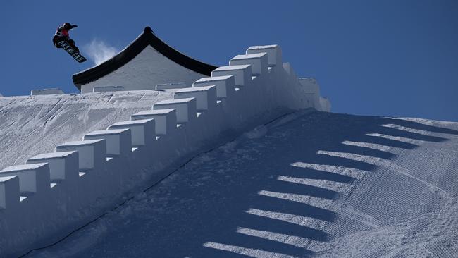 An athlete performs a trick during the Snowboard Slopestyle training session ahead of the Beijing 2022 Winter Olympic Games at the Genting Snow Park. Picture: Getty Images