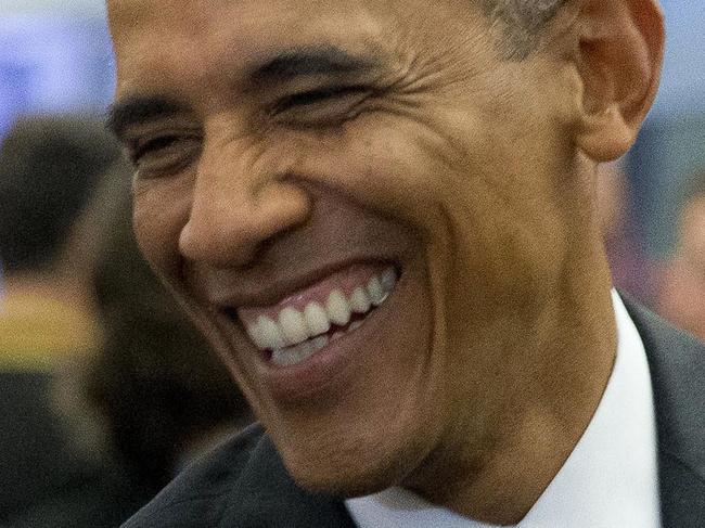 US President Barack Obama laughs with guests during a reception for NATO summit dignitaries in Newport, south Wales on September 4, 2014. The United States is preparing fresh sanctions against Russia over the Ukraine crisis in coordination with Brussels, which plans to announce further punitive measures on Friday, a White House official said. AFP PHOTO / MATT DUNHAM / POOL