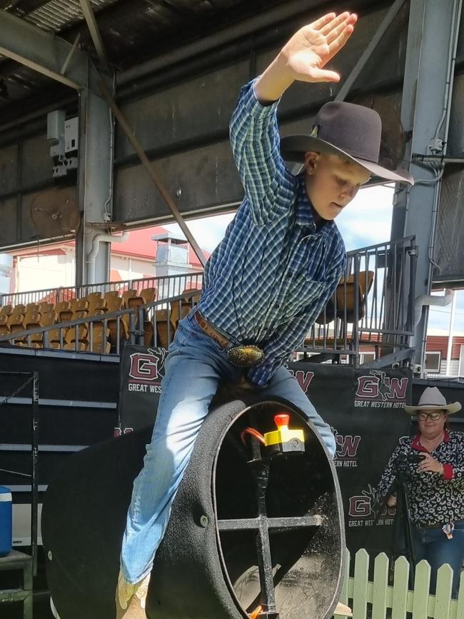 Angus Hollands trains on a mechanical bull at the Troy Dunn Bull Ride School in November 2022.