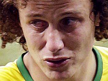 Brazil's David Luiz reacts as he leaves the pitch after the World Cup semifinal soccer match between Brazil and Germany at the Mineirao Stadium in Belo Horizonte, Brazil, Tuesday, July 8, 2014. Germany won 7-1. (AP Photo/Hassan Ammar)