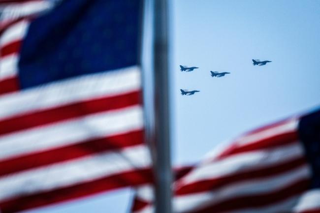 F-16 jets during a flyby over Nationals Park stadium in Washington, DC on March 30, 2023