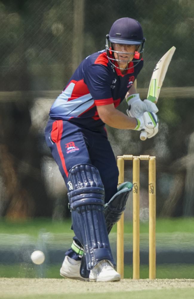 Tom Donnell drives down the ground during his half-century against Ringwood on Saturday.