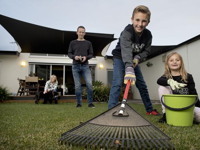 Linda and Darren James with son Kalan, 10, and Lyla, 8, and dog Oakley. Photo: Naomi Jellicoe