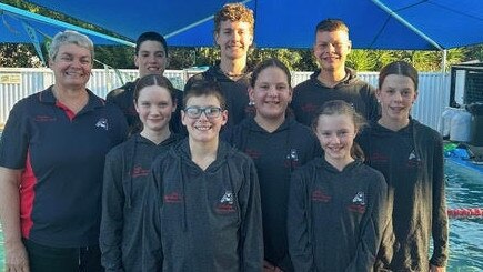 Caribeae head coach Jodie Shanks with swimmers (back row, from left) Levi Thomsen, Spencer Brown, Kallem Humphrey-Travers and (front row) Caroline Davey, Zachary Thomsen, Saidee Whitcombe, Jazmin McLean and Rose Brandon.