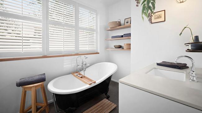 A claw-footed bath tub in one of the two bathrooms.