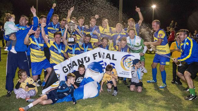 Broadbeach United players celebrate last season’s grand final win. Picture: Jerad Williams