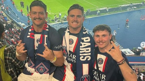 Liam Hampson (right) with Will (left) and AJ Brimson (middle) at a PSG game in Paris earlier this month.