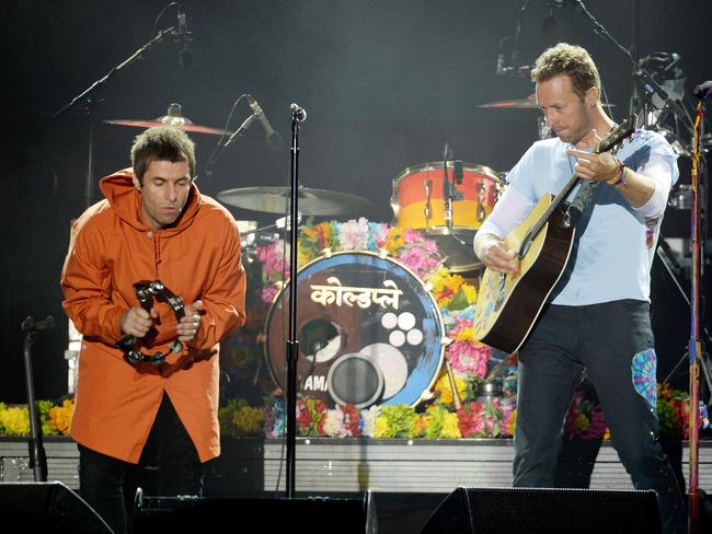 Liam Gallagher (left) and Chris Martin perform at the One Love Manchester benefit concert. Picture: AFP/Dave Hogan for One Love Manchester