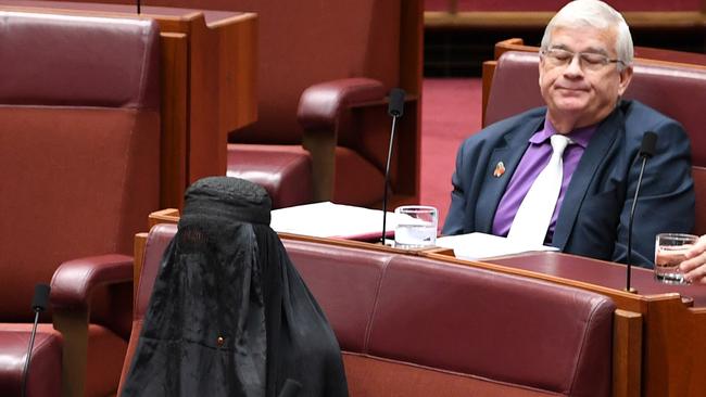 One Nation’s Pauline Hanson wears a burka in the Senate on August 17.