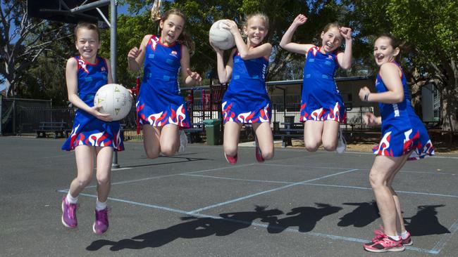 Maya, Sophie, Frankie, Zara and Leila are among the booming numbers of Port Melbourne Netball Club players. Picture: Richard Serong