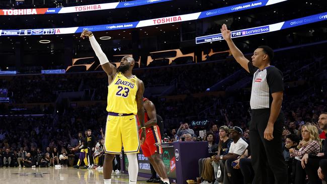 LeBron James reacts after his record-breaking shot. Picture: Ronald Martinez/Getty Images