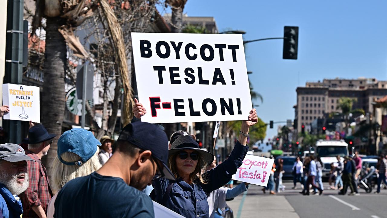 <!DOCTYPE html PUBLIC "-//W3C//DTD HTML 4.0 Transitional//EN" "http://www.w3.org/TR/REC-html40/loose.dtd"><html><body><p>Elsewhere in the US, peaceful &acirc;&#128;&#152;Tesla Takedown&acirc;&#128;&#153; protests against Musk and Tesla have been taking place all across the country. Picture: Frederic J. BROWN / AFP</p></body></html>