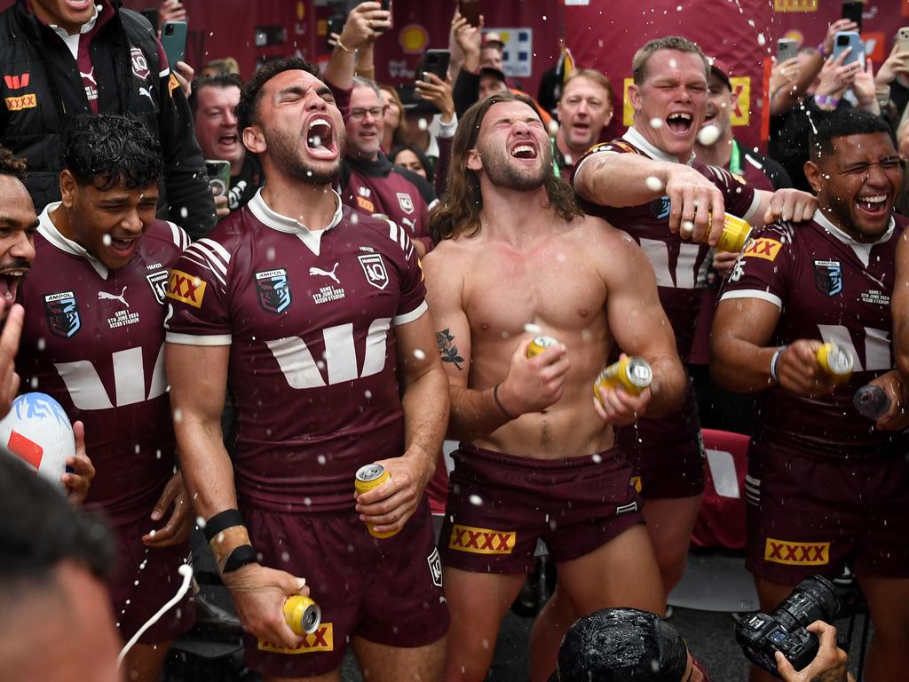 Carrigan and the Maroons celebrate their win in Origin I. Picture: NRL Photos