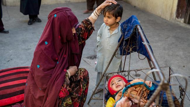 An Afghan refugee, Najiba, was deported from Pakistan with her son Hasibullah and daughter Nazia. A large survey of leaders in low- and middle-income countries reveals education, employment, peace and health are at the top of their development priorities. Picture: Wakil Kohsar/AFP