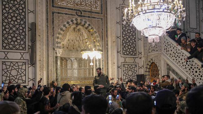 Ahmed al-Sharaa addresses a crowd at the capital's landmark Umayyad Mosque on December 8, 2024. Picture: AFP