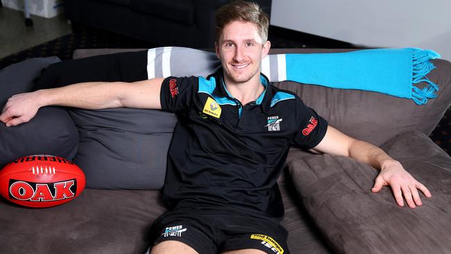 Hamish Hartlett at his home after signing a five-year contract extension with Port Adelaide. Picture: Sarah Reed.