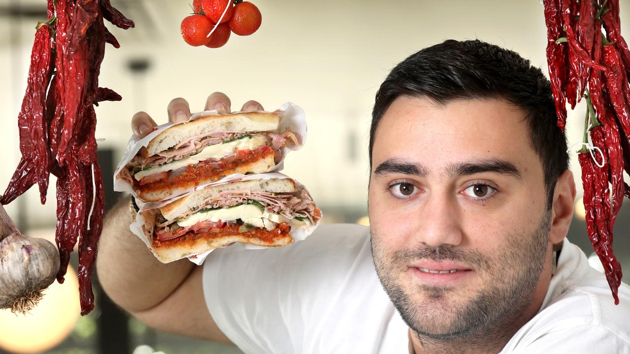 Tonino's on King William Road – Anna Lisa Barone’s husband, Stylianos Triantafyllidis, with one of their specialty sandwiches. Picture: Dean Martin