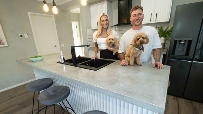 Aidan and Jean Hall with their dogs, Rio and Pumpkin, and are selling their house in Doreen, which is one of Melbourne’s fastest-selling suburbs. Picture: Tony Gough.