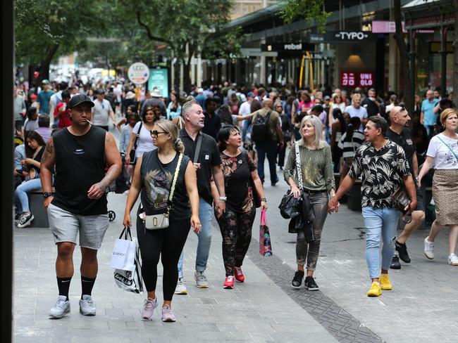 29/12/2022. Crowds of people in Pitt St Mall in Sydney out shopping during Boxing Day Sales. Britta Campion / The Australian