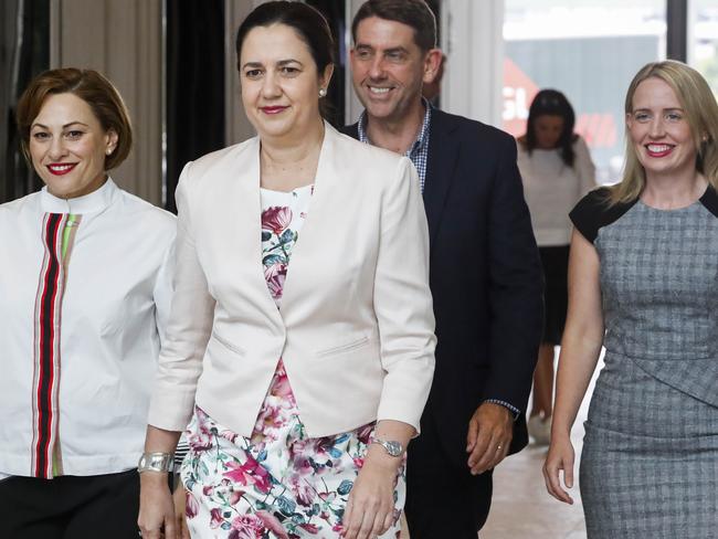 Queensland Premier Anna Palaszczuk (2nd left) with her new economic team, Jackie Trad (left), Cameron Dick and Kate Jones (right) in Brisbane, Sunday, December 10, 2017. Queensland Premier Annastacia Palaszczuk has given the treasury portfolio to her deputy Jackie Trad in a reshuffle of cabinet following the election. (AAP Image/Glenn Hunt) NO ARCHIVING