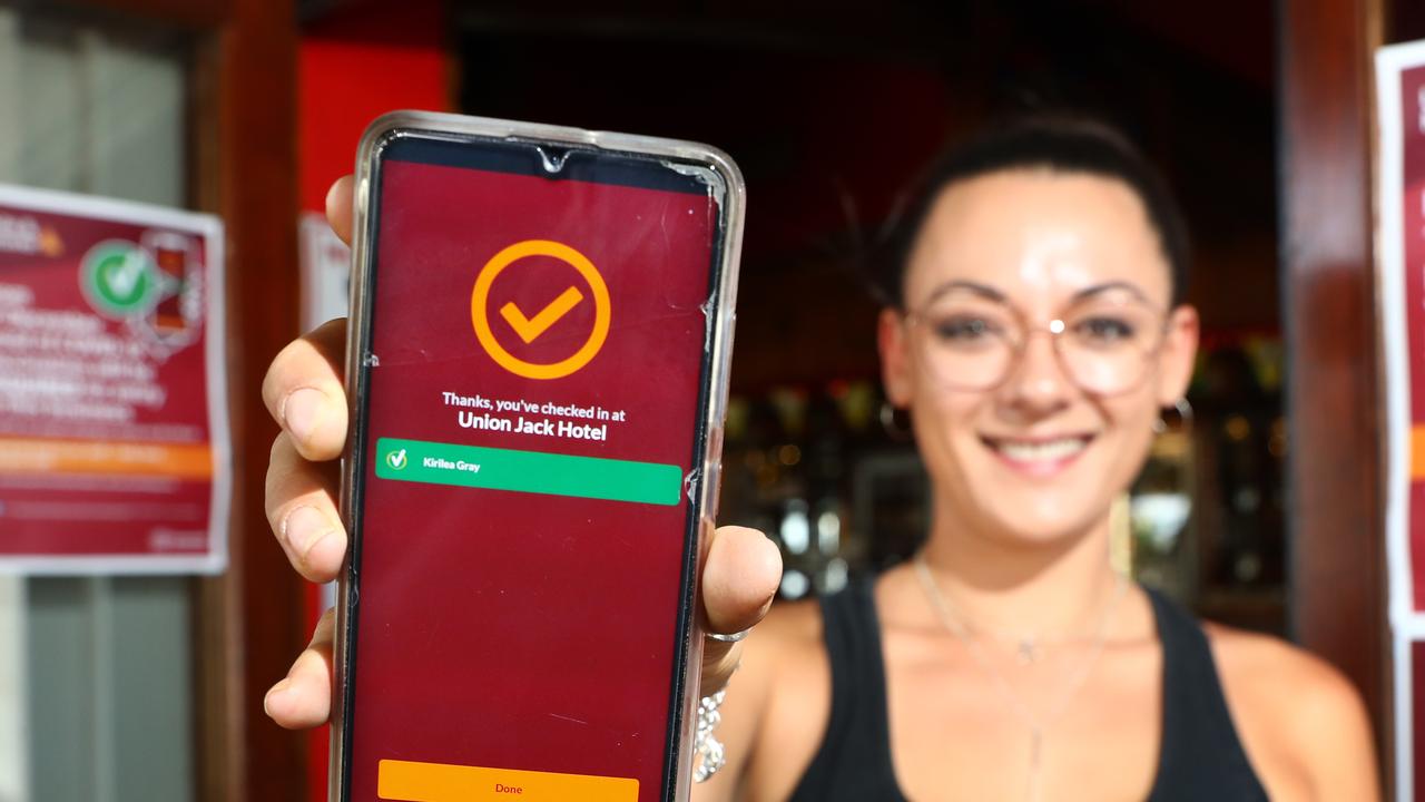 Kirilea Gray, bar manager at The Jack hotel shows correct proof of vaccination on the Check In Qld app. Picture: Brendan Radke