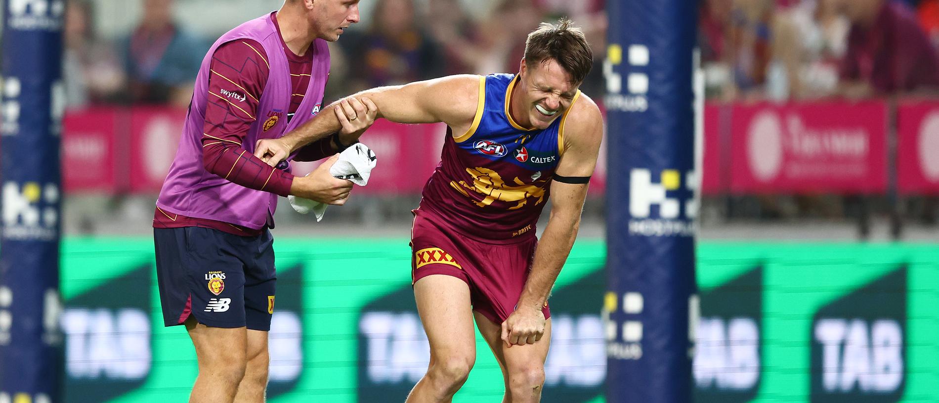 BRISBANE, AUSTRALIA - MAY 05: Lincoln McCarthy of the Lions is injured during the round eight AFL match between Brisbane Lions and Gold Coast Suns at The Gabba, on May 05, 2024, in Brisbane, Australia. (Photo by Chris Hyde/AFL Photos/via Getty Images )