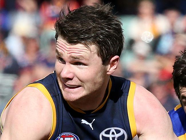 Adelaide Crows v West Coast Eagles at Adelaide Oval. Patrick Dangerfield runs away from Jack Darling. Photo Sarah Reed.