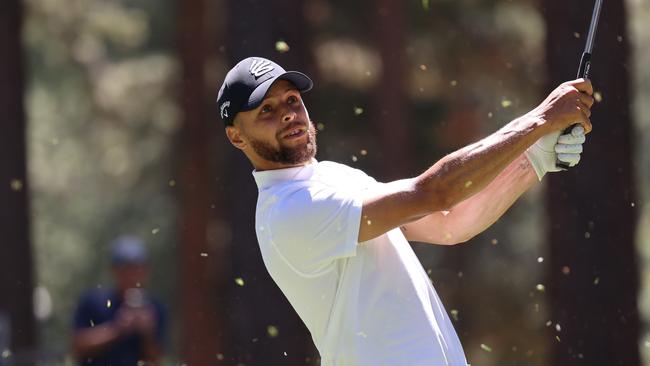 STATELINE, NEVADA - JULY 14: Stephen Curry of the NBA Golden State Warriors hits his tee on the 7th hole on Day One of the 2023 American Century Championship at Edgewood Tahoe Golf Course on July 14, 2023 in Stateline, Nevada. (Photo by Isaiah Vazquez/Getty Images)